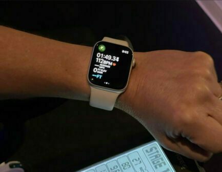 Apple Watch set to workout mode on a person's wrist.